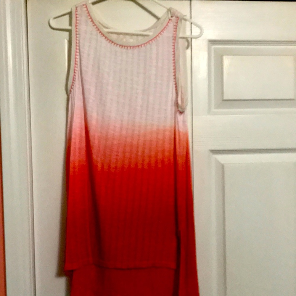 This is a Charming Charlie sleeveless summer shirt.